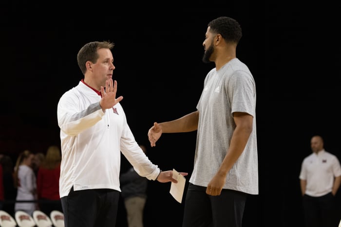 Bloomington South graduate Jonathan Holmes (left) is in his first year as an assistant coach for Miami of Ohio basketball.